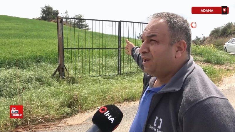 Adanalı çiftçi dört tarafı açık tarlasına demir kapı yerleştirdi